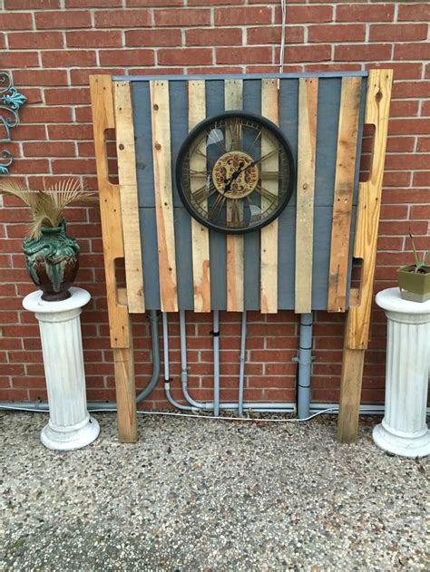 creative ways to cover electrical box on concrete patio|best way to hide water boxes.